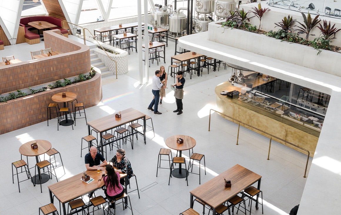 an overhead view of the jubilee hotel's atrium bar area